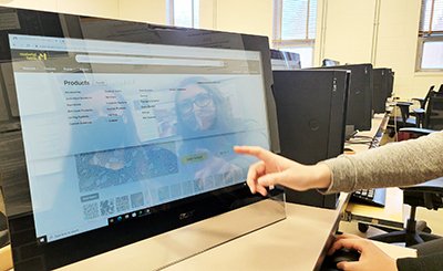 Interior design students Brea Holt and Carolyn Stensrud navigate Materialbank