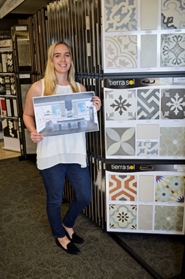 Emily Hartley showing her winning kitchen design