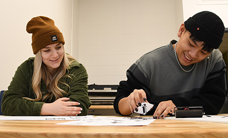 Students in the stamping room