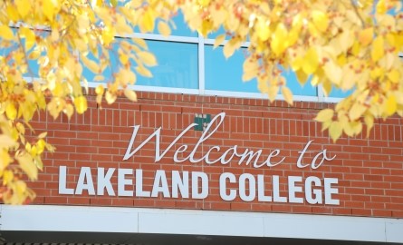 Fall leaves framing Welcome to Lakeland College on Lloydminster campus