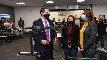 Agricultural sciences students showcase drones during Agricultural Technology Centre opening.