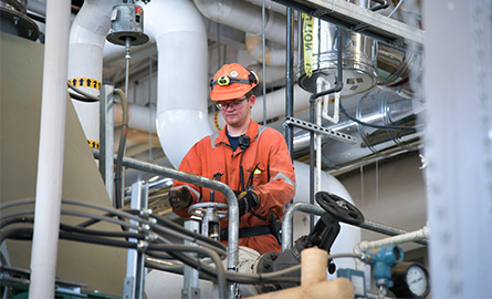 student in power engineering steam lab