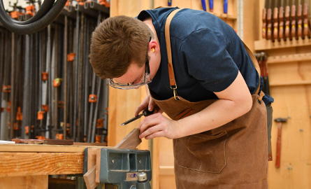 Student working in the carpentry shop