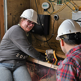 Students using a multimeter