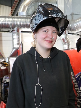 Hannah Ganske geared to practice her TIG welding.