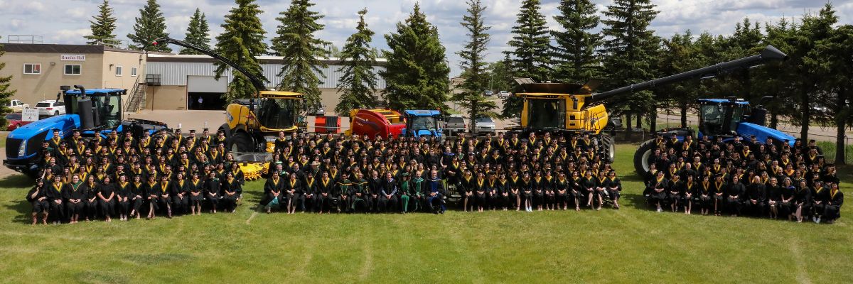 Agricultural sciences class of 2025 with New Holland machinery