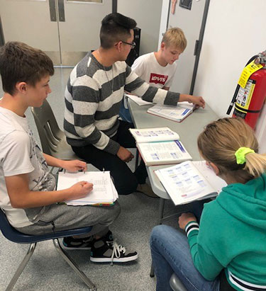 University transfer students tutor kids at St. Joseph Elementary School on Nov. 7.