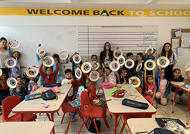 Lakeland students brought their own lesson plans to teach local children about Canadian culture