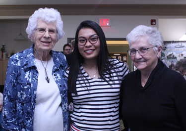 Thea Lomibao (centre) was excited to share her university experience with her friends at Hemstock and Hearthstone Place.