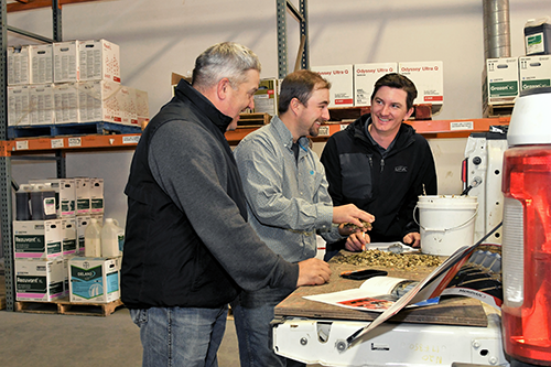 Three agricultural sales professionals at the Vermilion UFA Farm & Ranch Supply Store.