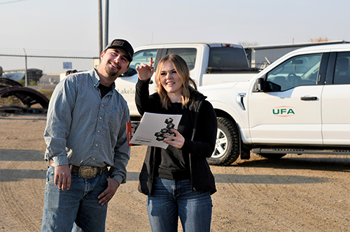 Two agricultural sales professionals at Vermilion UFA Farm & Ranch Supply Store.
