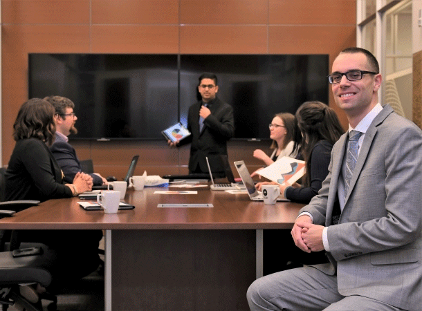Business students in board room setting