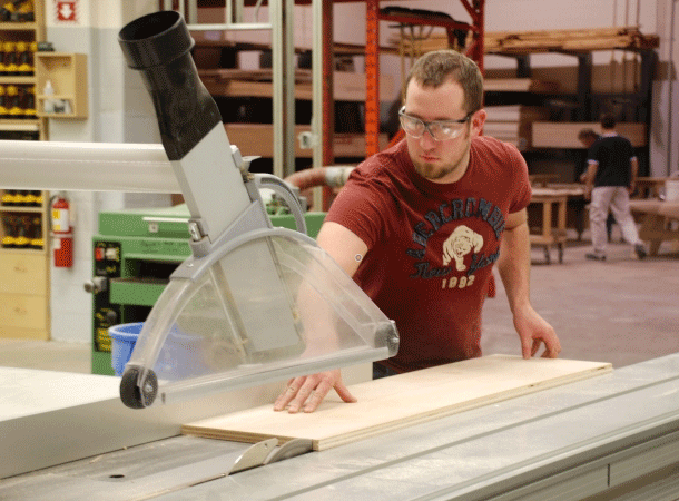 Student using a saw