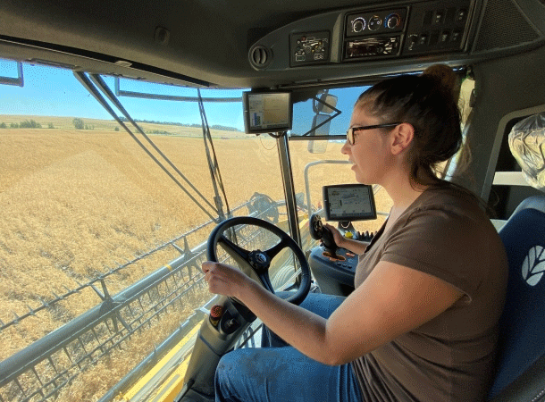Lakeland student driving a combine