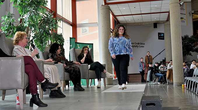 Brooklyn Gray, a business administration accounting major student, models at Dress for Success 2023.