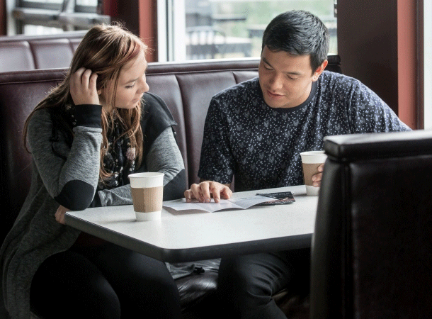 Students working together at a coffee shop